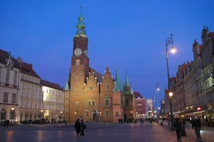 Wrocław Market Square at dusk with the town hall tower